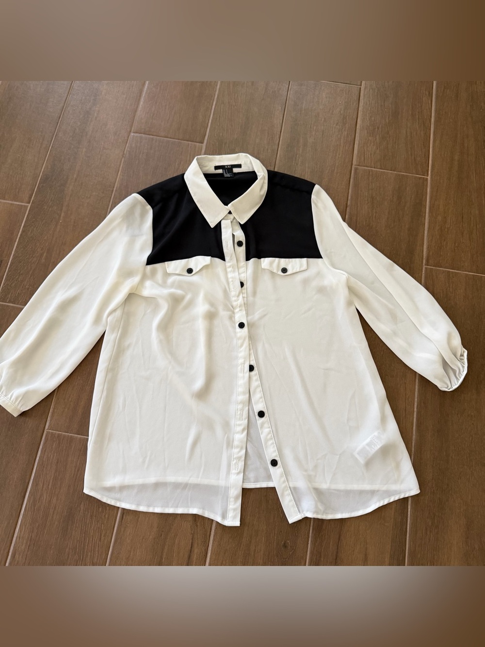 Two-Tone Black and White Button-Up Blouse